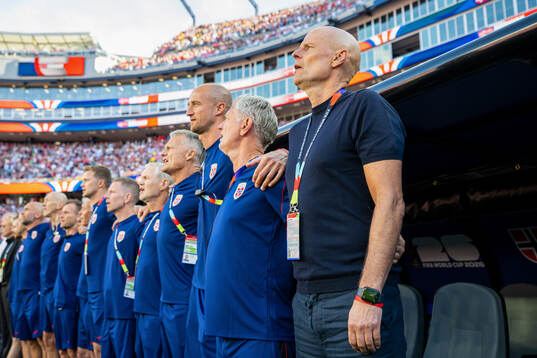 Head coach Ståle Solbakken of Norway and his coaching staff