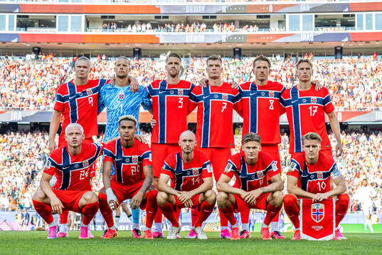 The starting eleven of Norway pose for a team photo