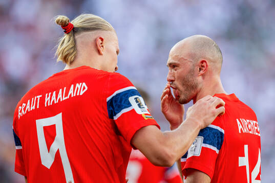 Erling Braut Haaland of Norway celebrates with teammate
