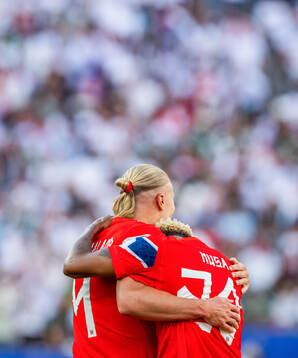 Erling Braut Haaland of Norway celebrates with teammate