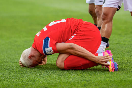 Julian Ryerson of Norway in pain