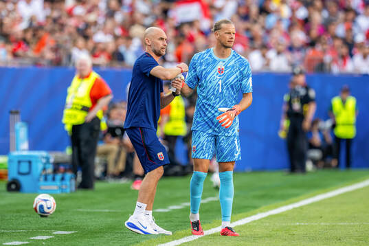 Sigurd Ertsås, kit manager, and goalkeeper Ørjan Nyland