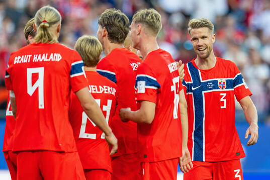 Kristoffer Ajer of Norway celebrates