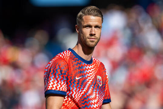Kristoffer Ajer of Norway warms up