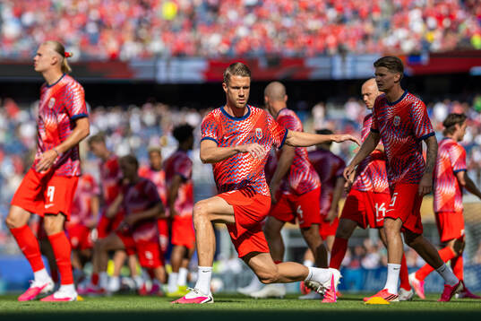 Kristoffer Ajer of Norway warms up