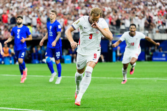 Harry Kane of England celebrates scoring 1-0
