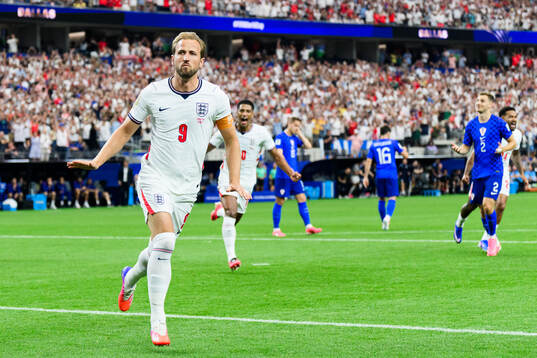 Harry Kane of England celebrates scoring 1-0