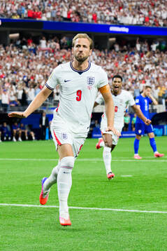 Harry Kane of England celebrates scoring 1-0