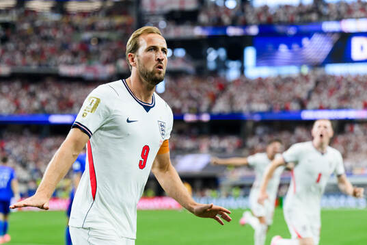 Harry Kane of England celebrates scoring 1-0