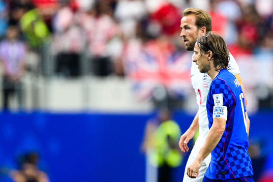 Harry Kane of England and Luka Modric of Croatia