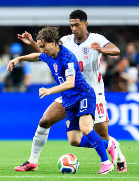 Luka Modric of Croatia and Jude Bellingham of England
