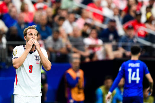 Harry Kane of England looks dejected