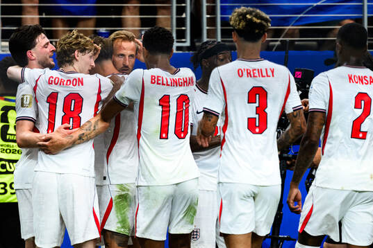 Harry Kane of England celebrates scoring 2-1
