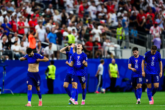 Petar Musa of Croatia celebrates scoring 2-2