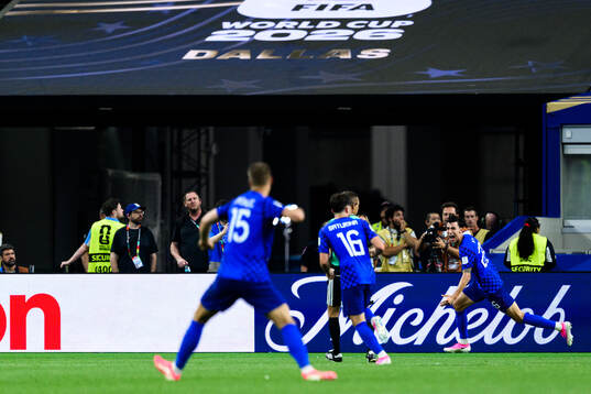 Petar Musa of Croatia celebrates scoring 2-2
