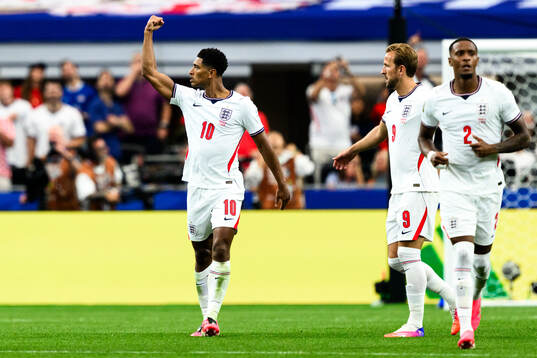 Jude Bellingham of England celebrates scoring 3-2