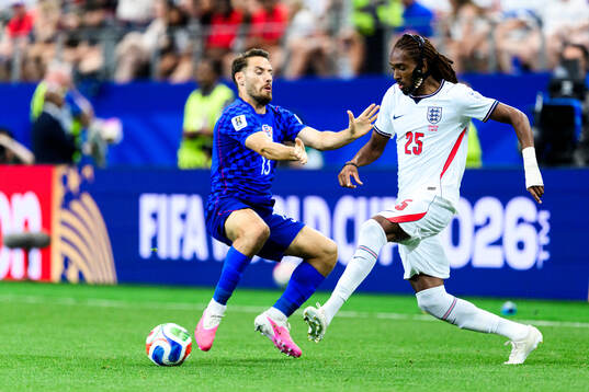 Nikola Vlasic of Croatia and Djed Spence of England