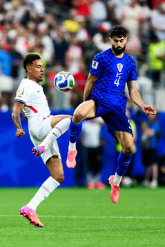 Morgan Rogers of England and Josko Gvardiol of Croatia