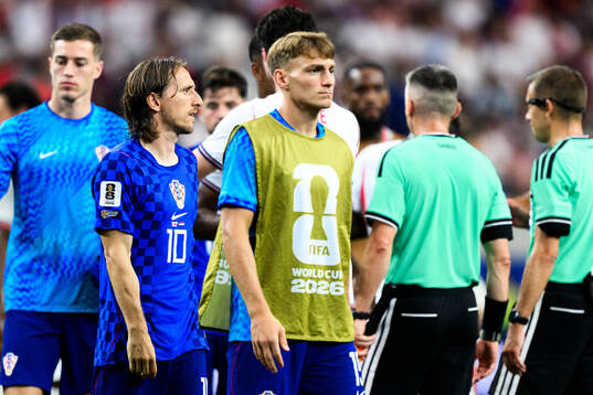 Luka Modric of Croatia looks dejected
