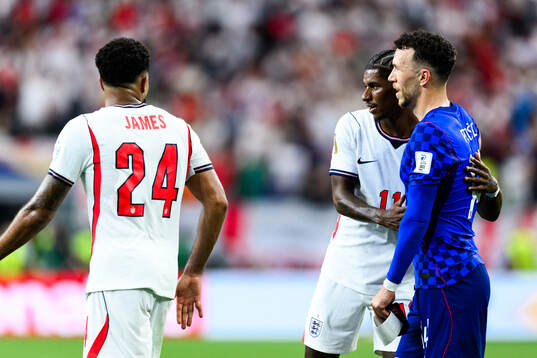 Marcus Rashford of England and Ivan Perisic of Croatia
