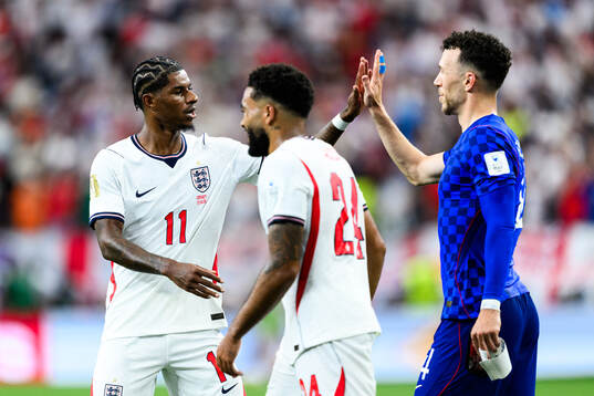 Marcus Rashford of England and Ivan Perisic of Croatia