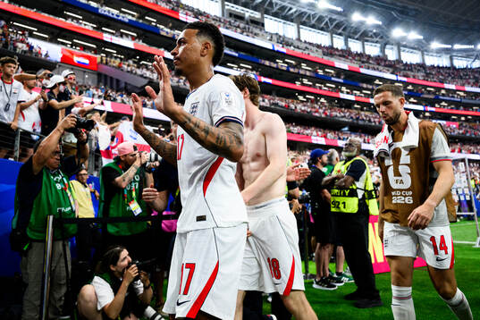 Morgan Rogers and Jordan Henderson of England