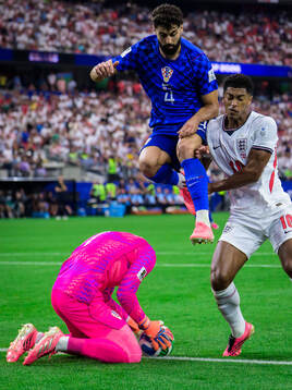 Goalkeeper Dominik Livakovic and Josko Gvardiol of Croatia