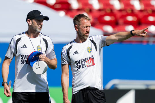 Assistant coach Andreas Georgson and head coach Graham
