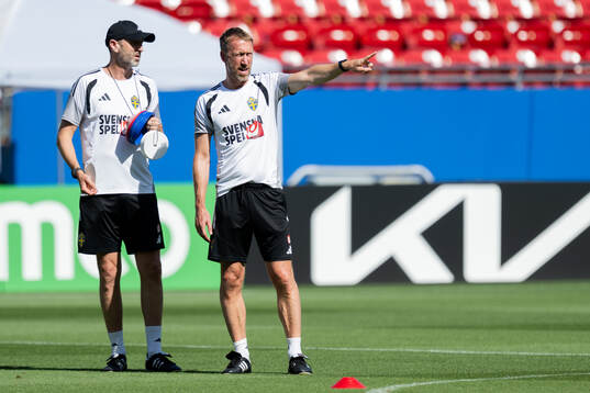 Assistant coach Andreas Georgson and head coach Graham