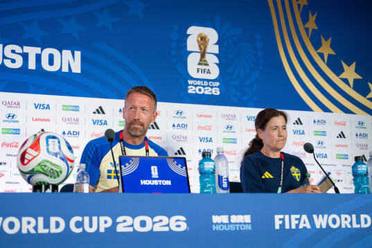 Head coach Graham Potter and Petra Thorén, press officer