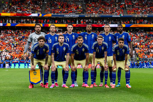 The starting eleven of Sweden pose for a team photo. From