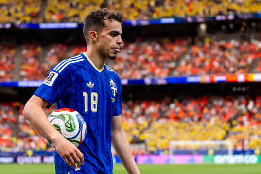 Yasin Ayari of Sweden looks dejected