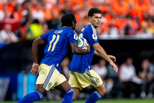 Anthony Elanga of Sweden celebrates with Besfort Zeneli