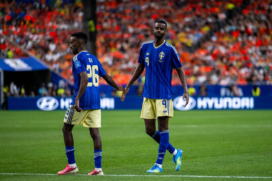 Taha Ali and Alexander Isak of Sweden