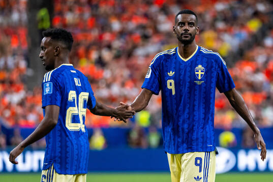 Taha Ali and Alexander Isak of Sweden