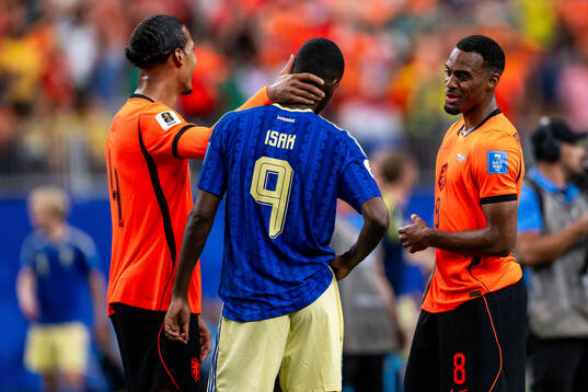 Virgil Van Dijk and Ryan Gravenberch of Netherlands with