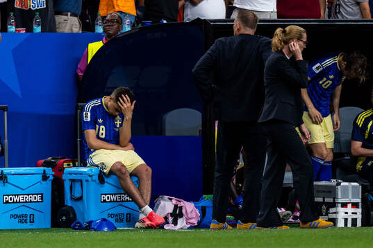 Yasin Ayari of Sweden looks dejected