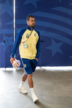 Goalkeeper Kristoffer Nordfeldt of Sweden arrives at