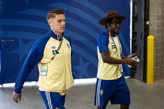 Viktor Gyökeres and Anthony Elanga of Sweden arrive at