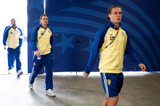 Carl Starfelt and Mattias Svanberg of Sweden arrive at