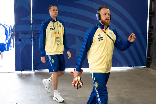 Gustaf Nilsson and goalkeeper Viktor Johansson  of Sweden