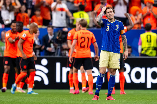 Victor Nilsson Lindelöf of Sweden looks dejected
