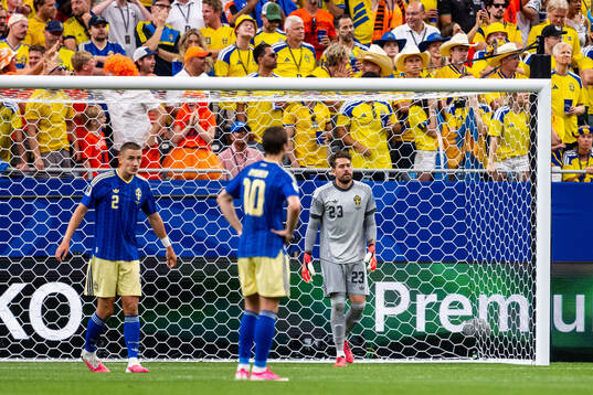 Gustaf Lagerbielke and goalkeeper Kristoffer Nordfeldt of