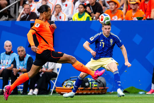 Virgil Van Dijk of Netherlands and Viktor Gyökeres of