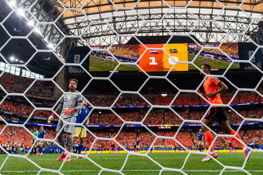 Goalkeeper Kristoffer Nordfeldt of Sweden looks dejected