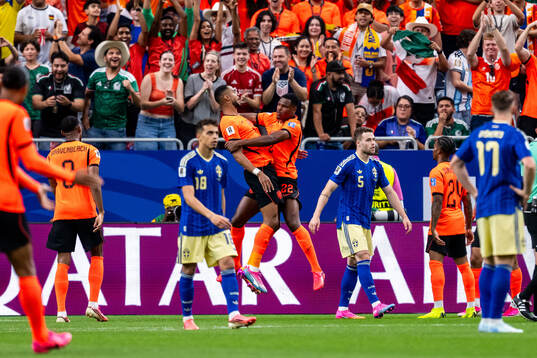 Yasin Ayari and Gabriel Gudmundsson of Sweden look dejected