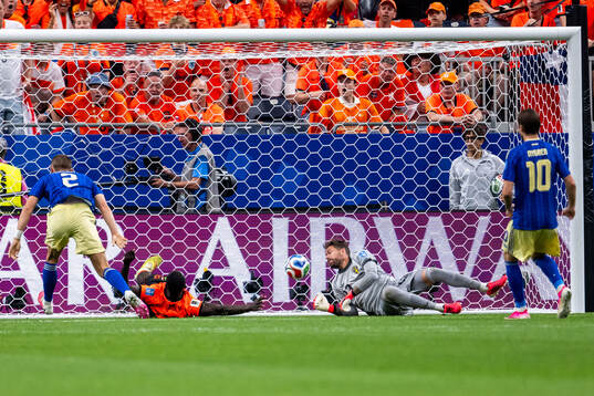 Cody Gakpo of Netherlands scores 3-0 behind goalkeeper