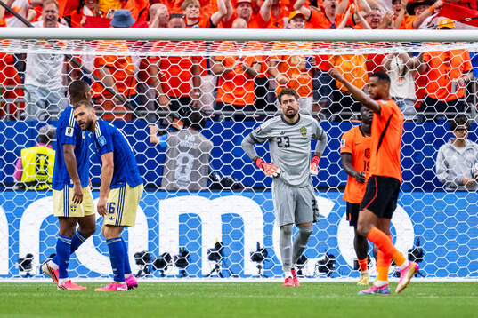 Goalkeeper Kristoffer Nordfeldt of Sweden looks dejected