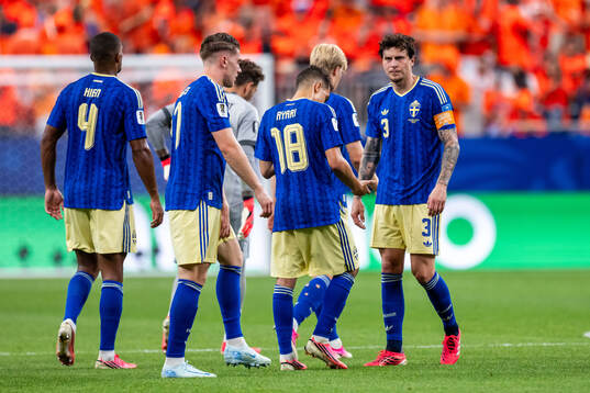 Victor Nilsson Lindelöf of Sweden looks dejected
