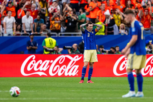 Victor Nilsson Lindelöf of Sweden looks dejected